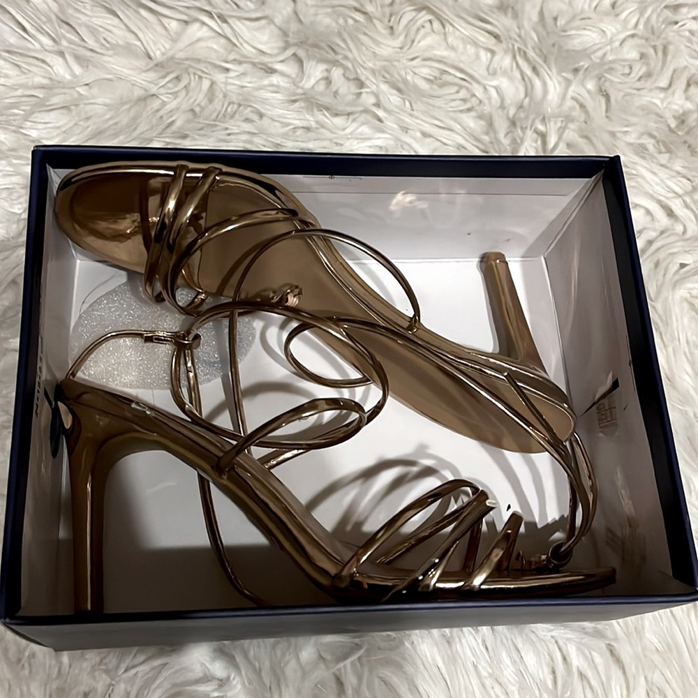 Shiny brown heels
